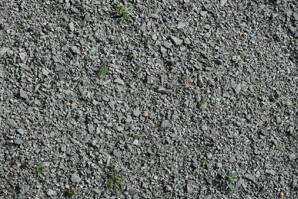 有杂草的灰色碎石路面贴图